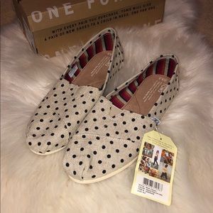 Brand new, never been worn Toms